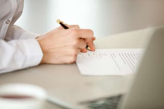bigstock-Businesswoman-Signing-Paper
